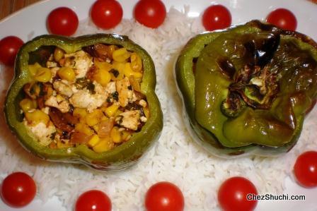 brushing oil on stuffed bell pepper